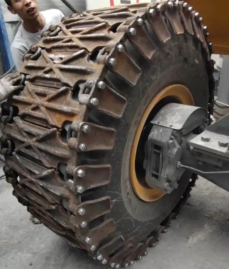 What is the weight of a set of dump truck anti-skid tracks?